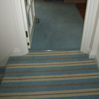 Modern stripe carpet stairs and lounge